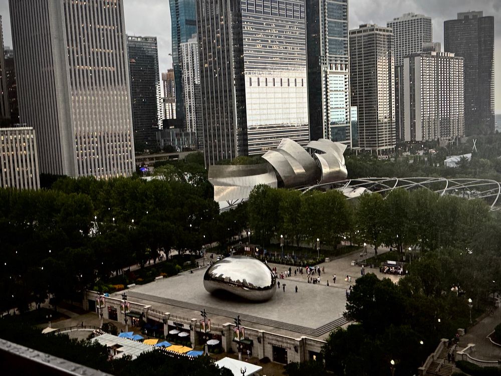 The Bean as seen during an early evening oncoming storm from a michigan ave rooftop. tourists have mostly dispersed