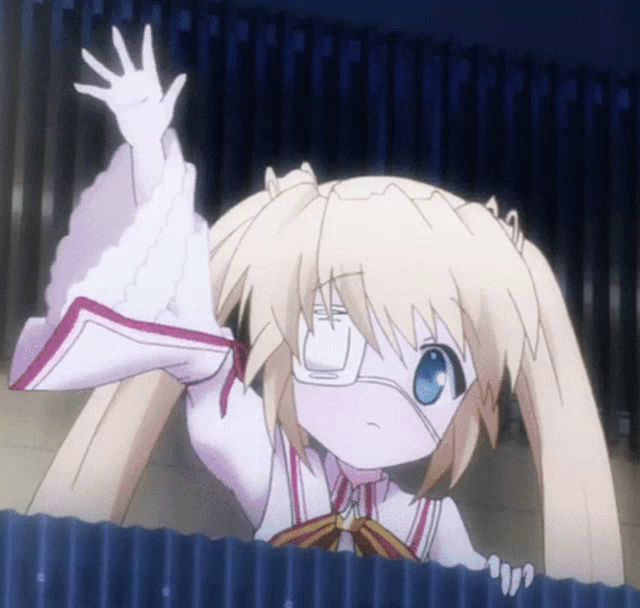 a girl with glasses and a bandage on her eye is waving her hand