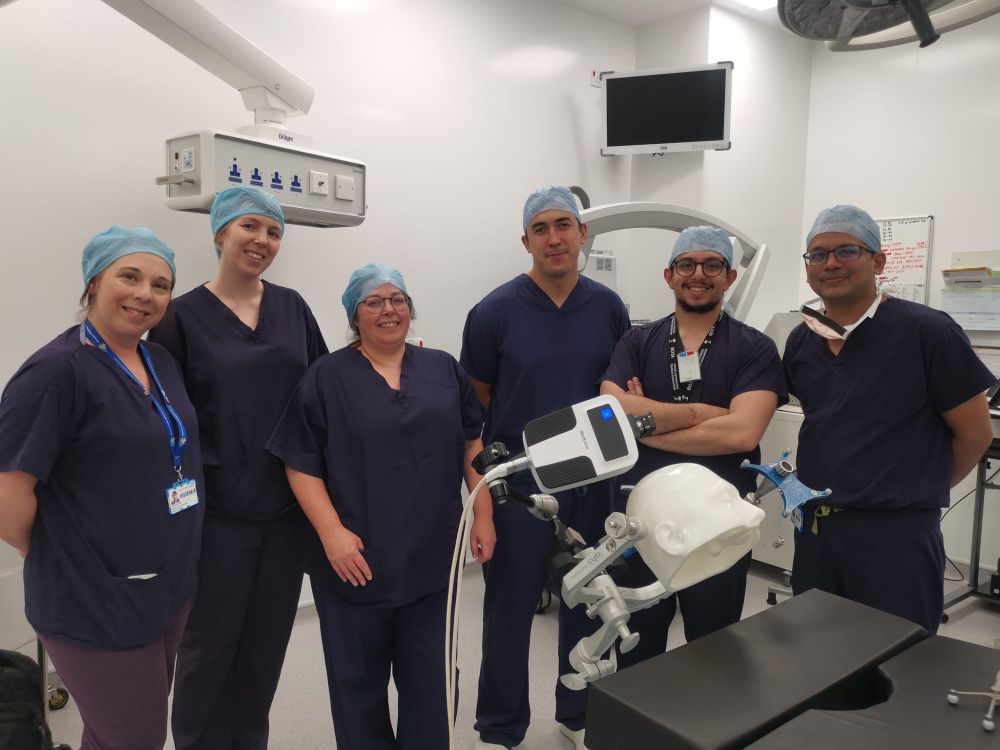 UHS staff with the Stealth Autoguide Surgical Robot 