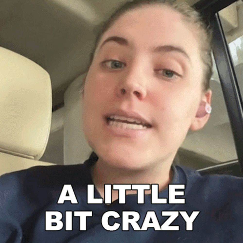 a woman in a car with the words a little bit crazy on the bottom