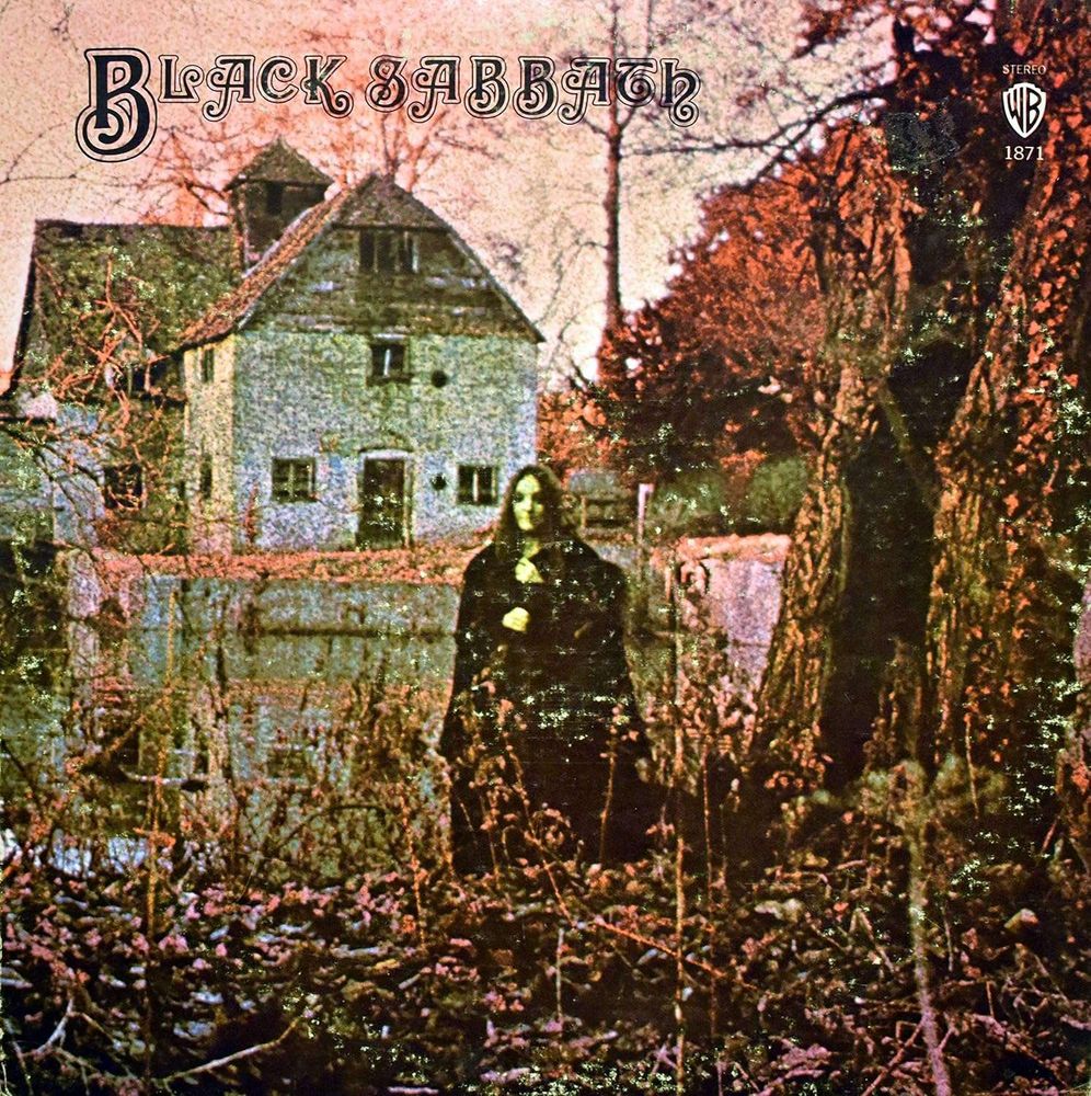 The cover to Black Sabbath's first album. A mysterious figure stands in front of Mapledurham Watermill, as darkness descends.