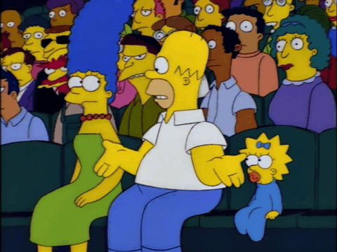 Gif from Lisa on Ice where Maggie athletically snags a beer bottle one handed right before it would have smashed into Homer's head just as he is badmouthing her.