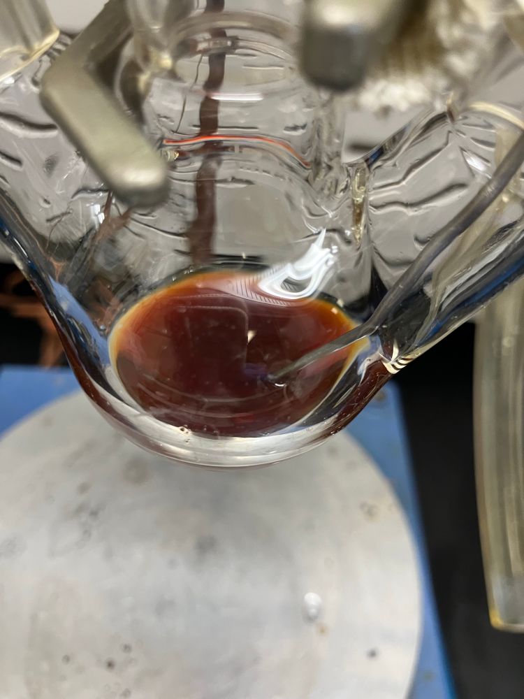 Flask with brown liquid
