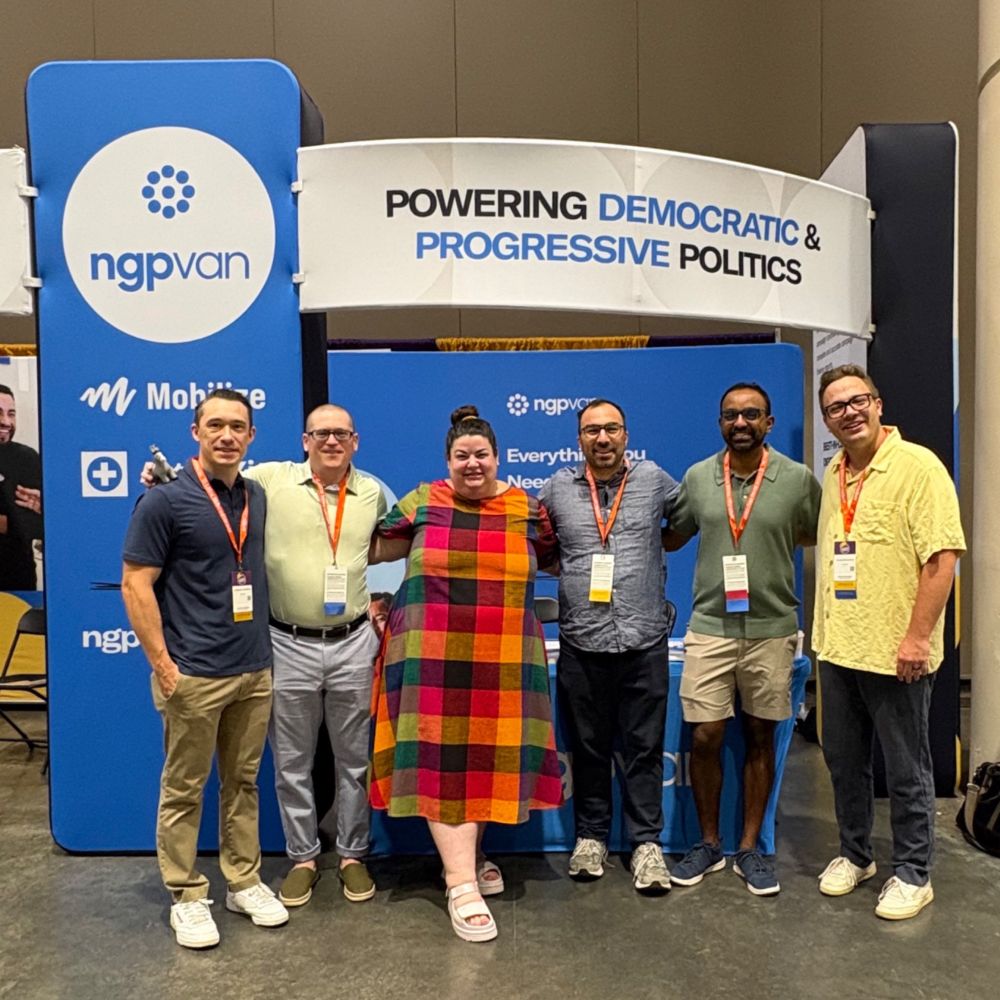 The NGP VAN team in front of their booth at Netroots Nation