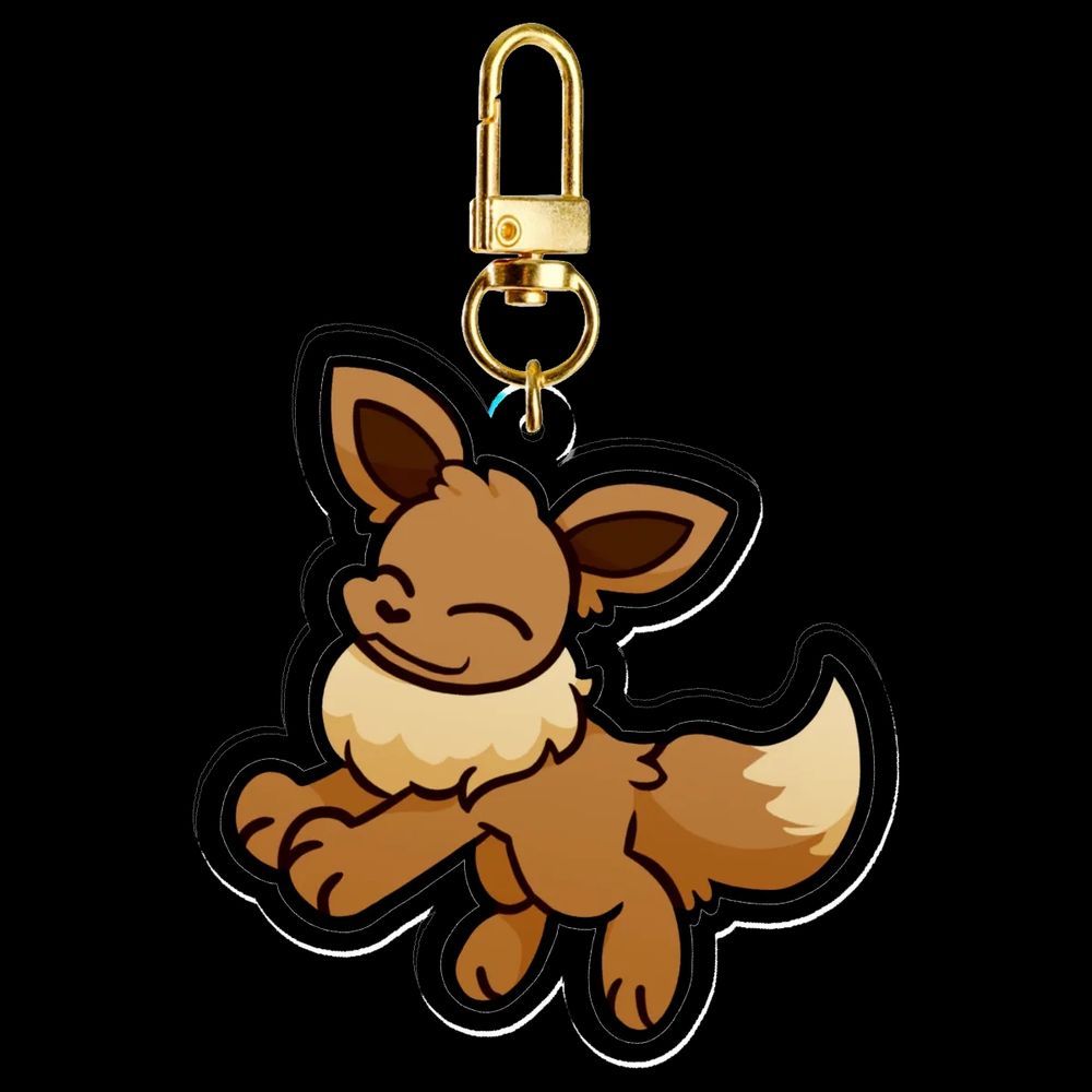 A drawing of the pokemon Eevee shown as a acrylic keychain.