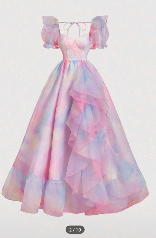 Screenshot of a pastel pink and rainbow princess style dress with puffed sleeves and a tie for the back