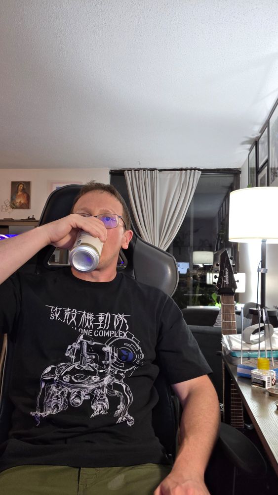 Me, drinking a Trippel Trouble Belgian-style trippel from Moon Under Water Brewing.