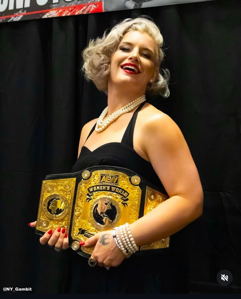 Timeless Toni Storm holding her AEW women's championship 