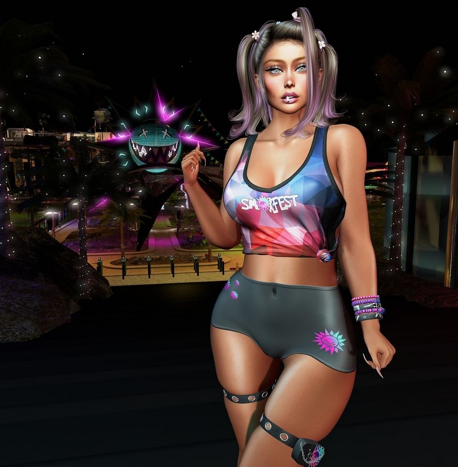 Female #Secondlife avatar dressed in SMOKEFESY branded shirt and shorts, standing in front of the smokefest face at the Boardwalk.
