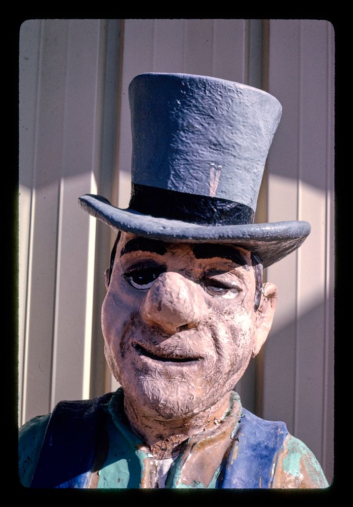two stiffs selling gas, closer detail (one statue), lovelock, nevada, 1991