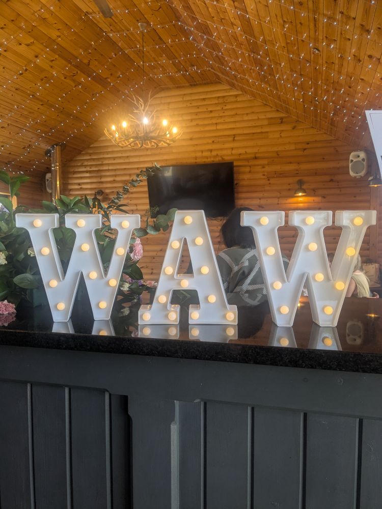 WAW Womens Academy Wales letters with lights in them