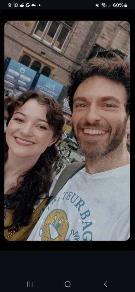 Popular comedian Gianmarco Soresi poses for a picture with a fan outside of the Edinburgh venue. Daytime.