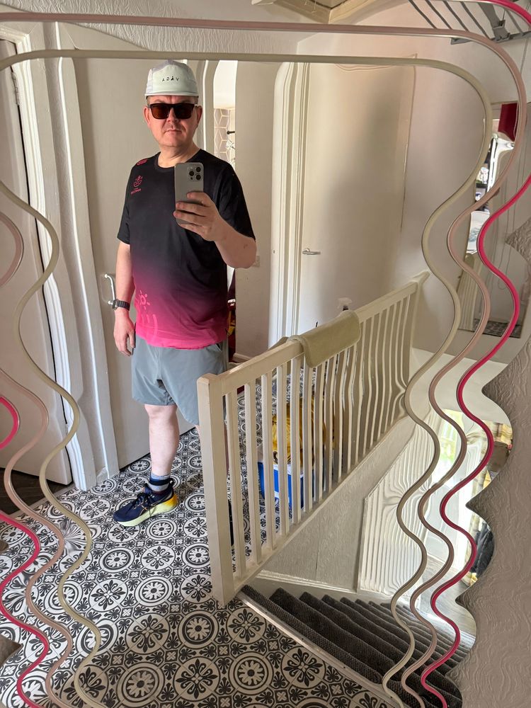 Mirror selfie in running gear. 