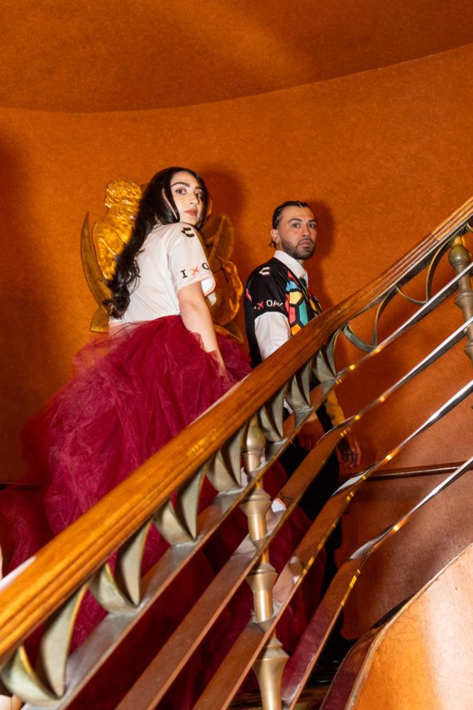 Images of people modeling the Oakland Roots and Soul 2024 kits at the Paramount Theater.