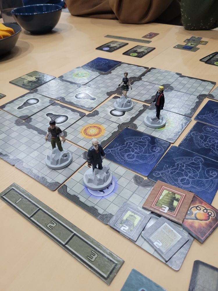Up close photo of the Angel of Darkness board game mid-playthrough