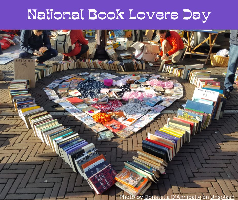 A photograph of a street vendor's books, arranged in a heart, with the words "National Book Lovers Day" above it.