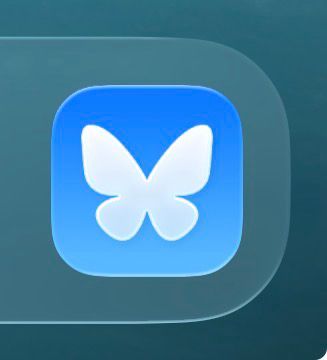 Bluesky app icon on iOS 26. It’s glassy