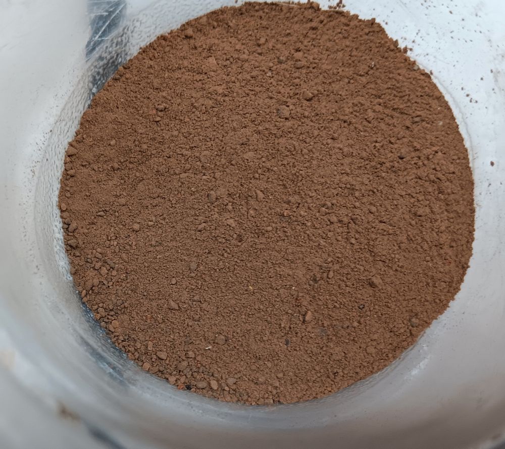Ground & blended clay slightly reddish-brown