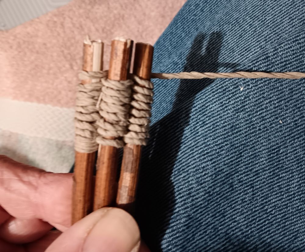 Creating 3 cord wrapped dowels using hemp twine.