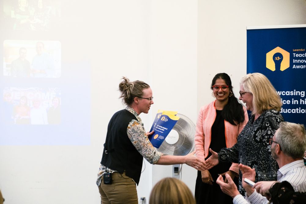 Dr Leanne William's handing over Teaching Innovation Award certificates to Dr Smita Odedra and Dr Linnea Soler.