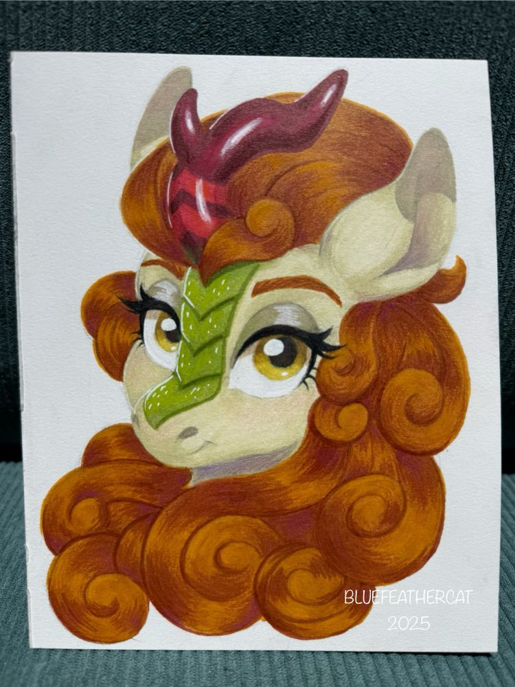An illustrated headshot of Autumn Blaze from My Little Pony: Friendship is Magic.