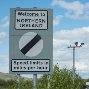 Roadsign saying "Welcome to Northern Ireland"
"Speed limits in miles per hour"