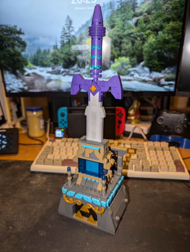 LEGO Mastersword from Legend of Zelda series in a stand inspired by and designed to look like the various devices and shrines in Breath of the Wild/Tears of the Kingdom