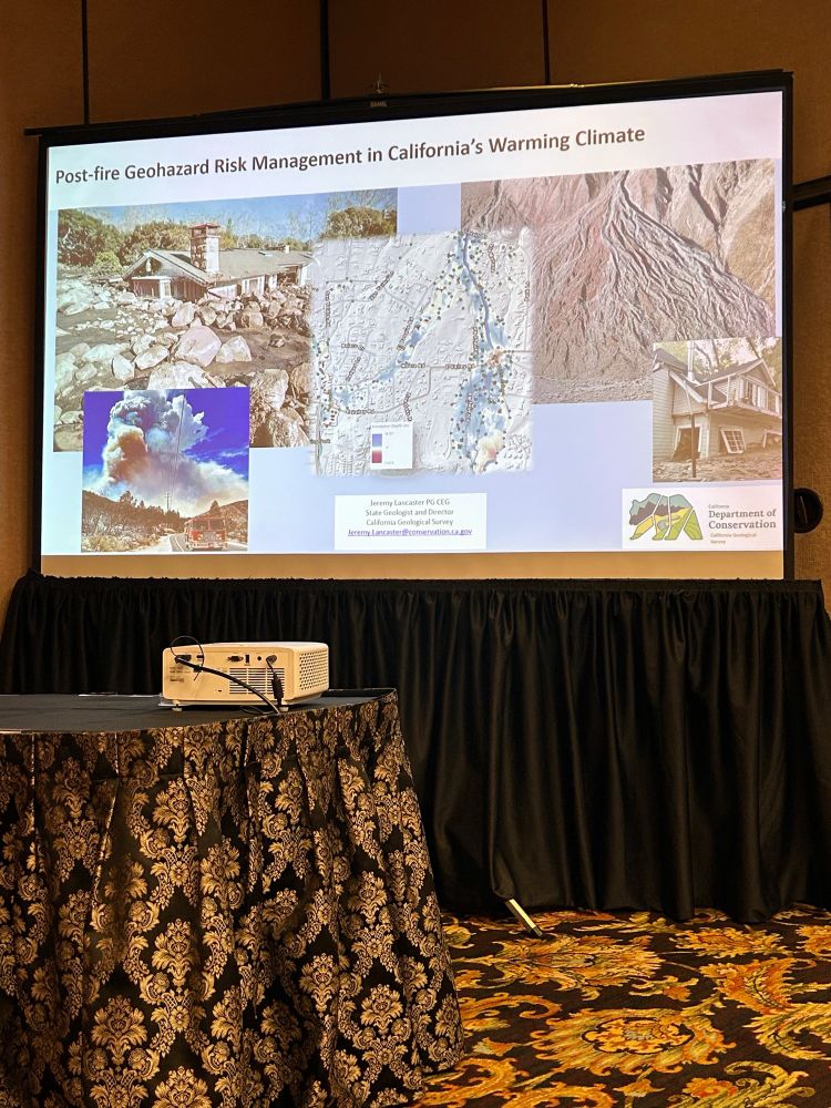 Title slide of Jeremy Lancaster’s talk reading “Post-Fire geohazard management in California’s warming climate”.