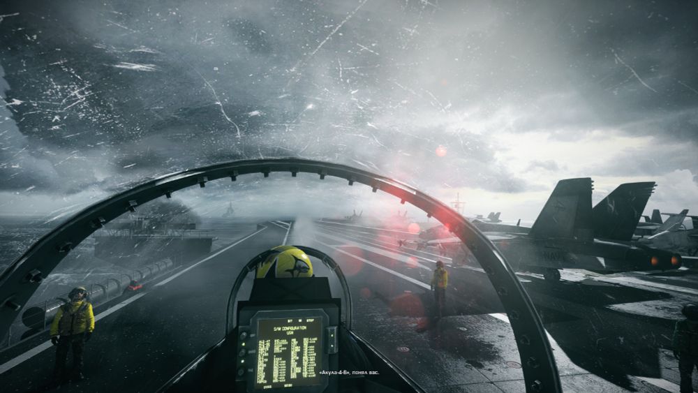View from the cockpit of a fighter jet on a aircraft carrier together with another fighter jet on the right, both ready to take off.