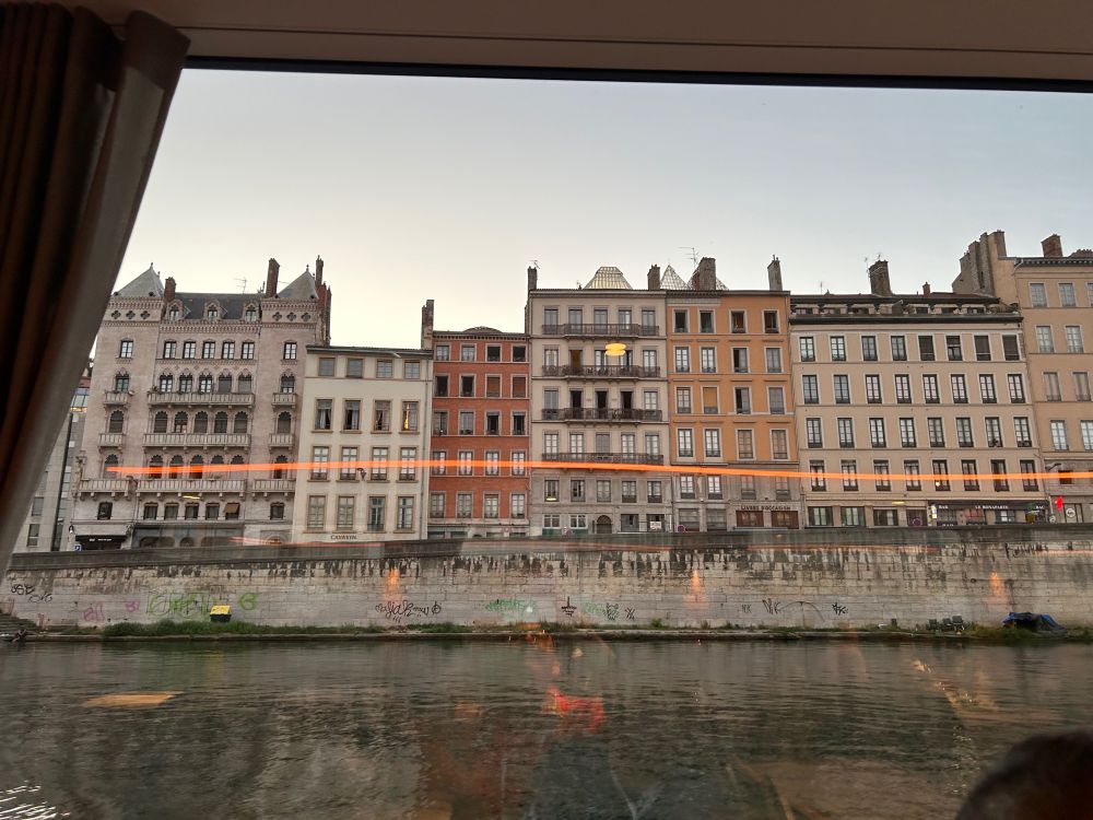 A Lyon cityscape along the river showing 18th Century (?) buildings.