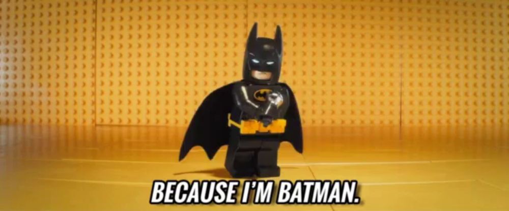 a lego batman says because i 'm batman on a yellow background