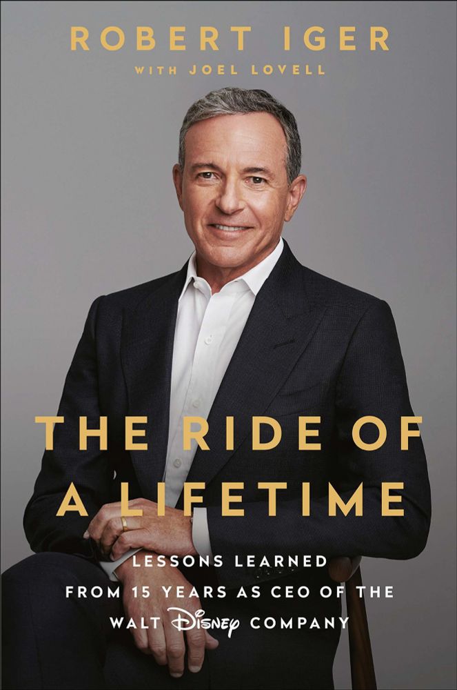 The book cover of The Ride of a Lifetime by Robert Iger. The cover is clean and professional, with a photo of the former Walt Disney Company CEO sitting in front of a grey backdrop. 