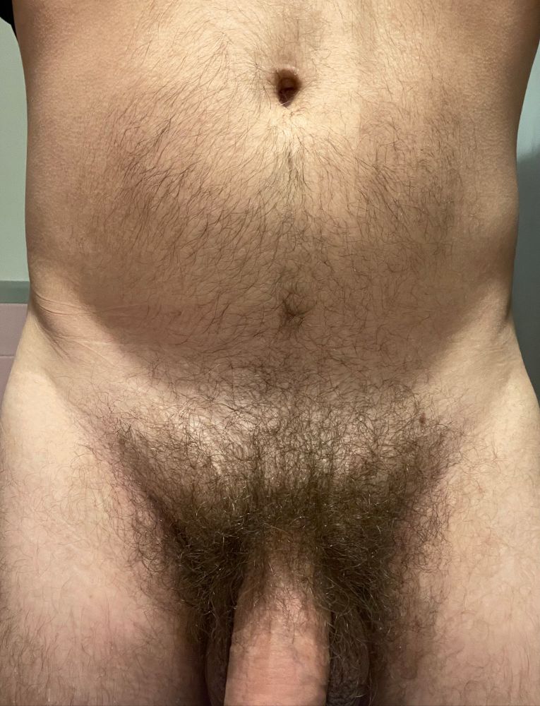 bush, dick root, and torso of a sleepy boy on tummy tuesday.