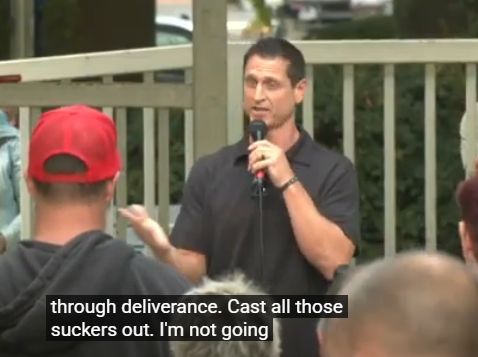 middle-age white man with a mic. Caption: "through deliverance. Cast all those suckers out. I'm not going..."