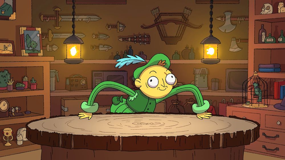 A yellow merchant in green medieval clothing leans over a wooden stump table, beckoning you into his dark wood colored mysterious shop.