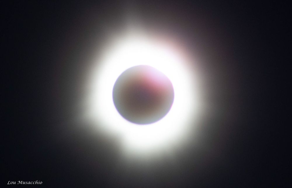 The solar eclipse from last year. And now my attempt at poetry. 