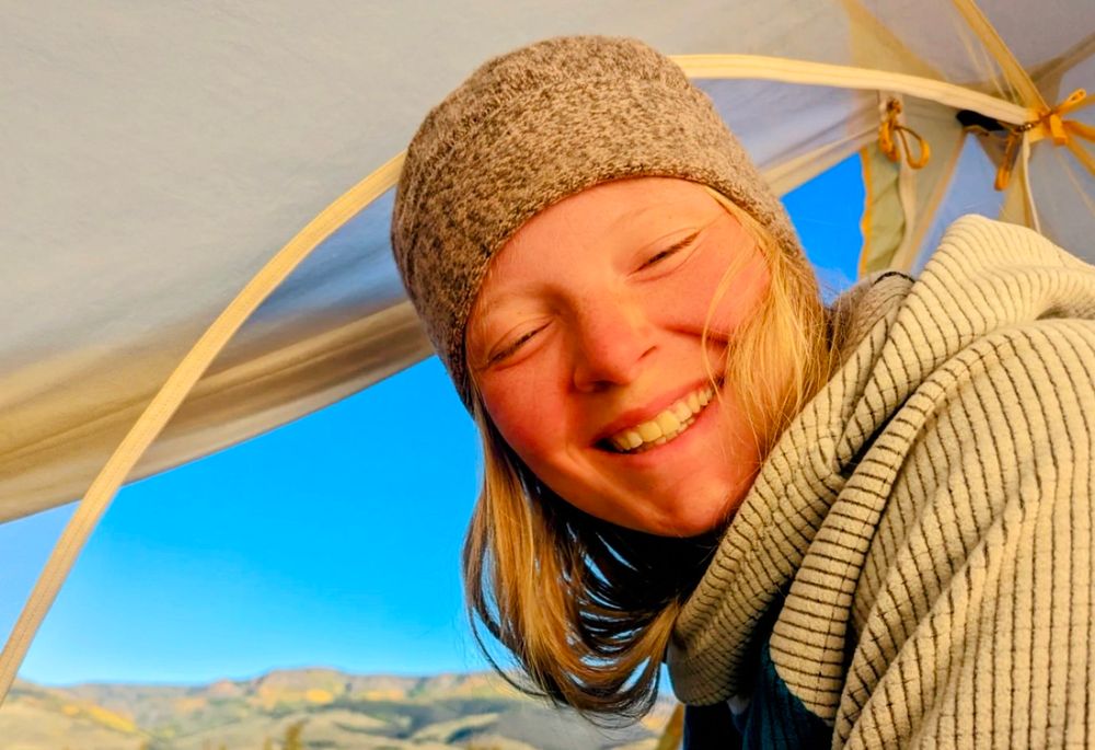 Me in front of my open tent flap on a cold morning.