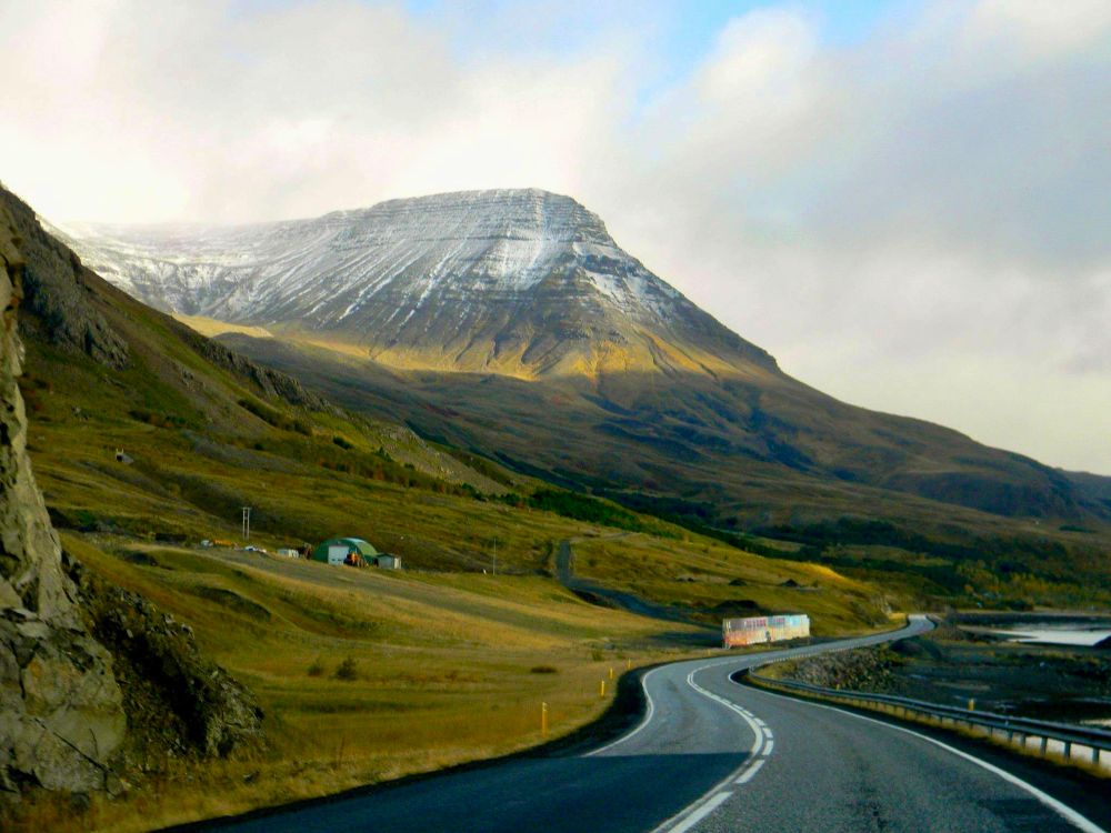 Highway one, Westerland, Iceland. Snow covered hills and winding road. 