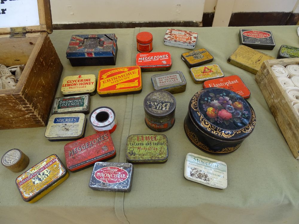 Tins of medicines, plasters, etc at the General Store.