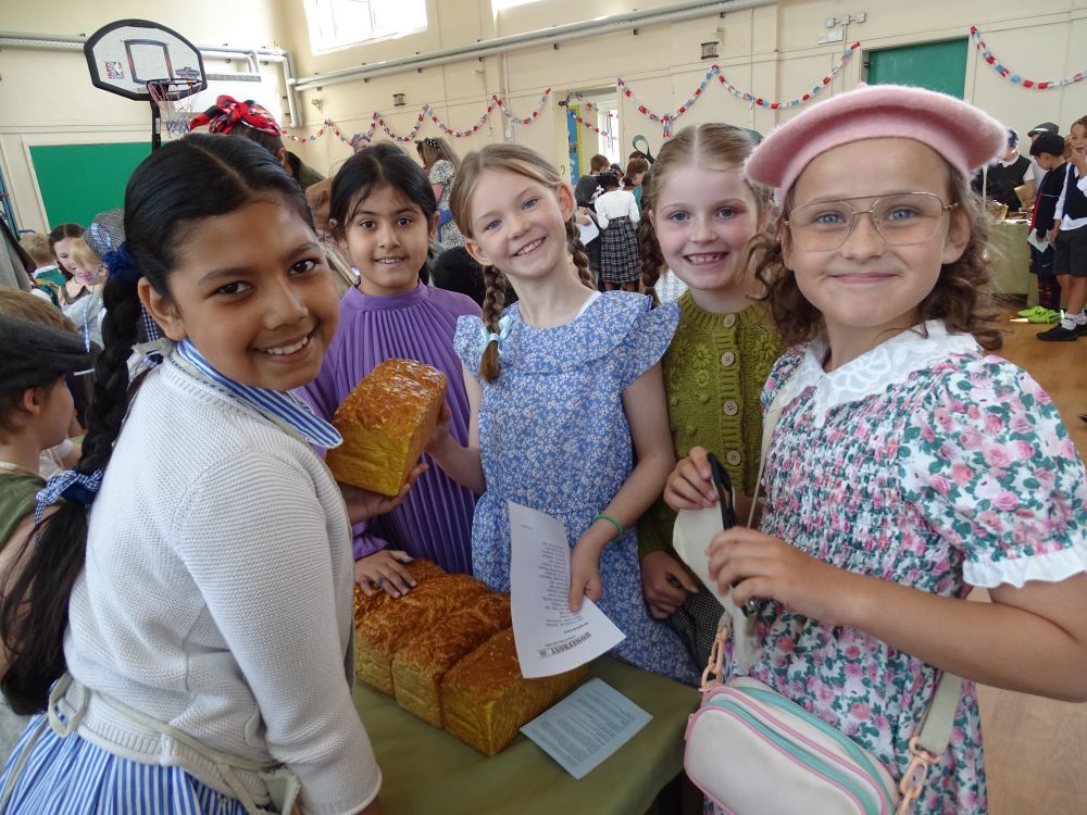 Smiling girls at the Bakery.