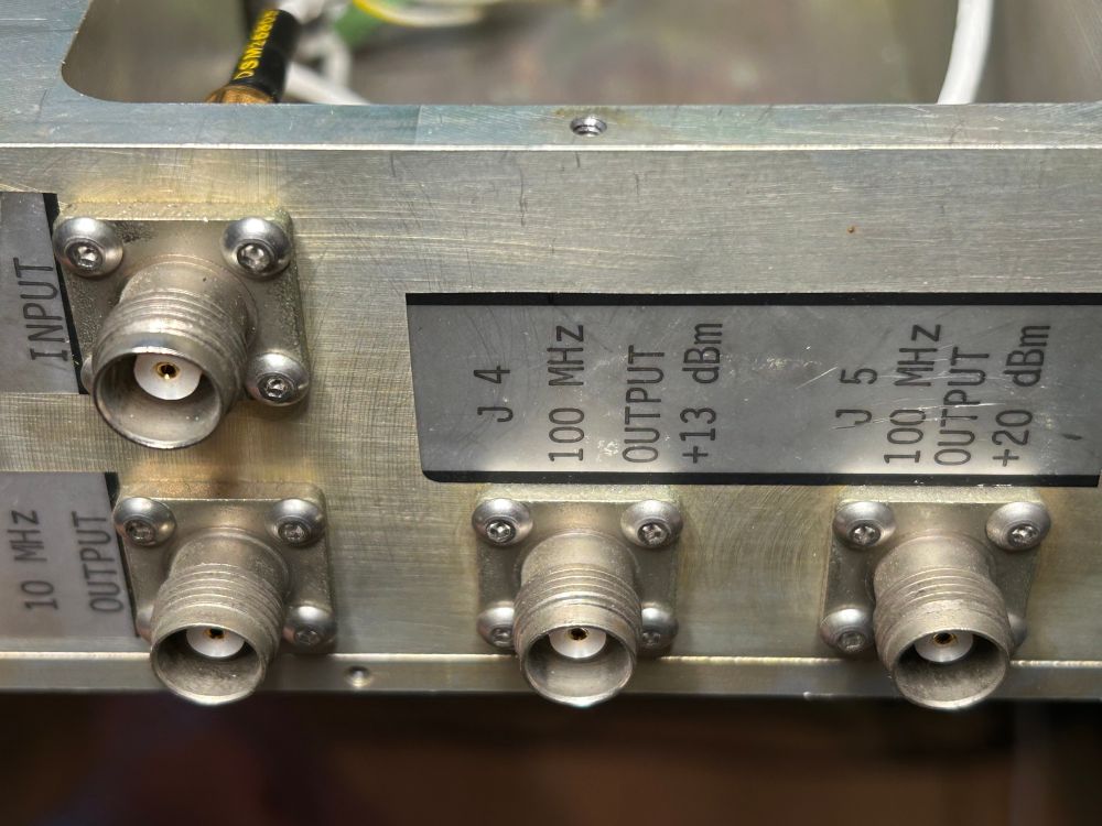 BNC-like screw connectors on synthesizer. 