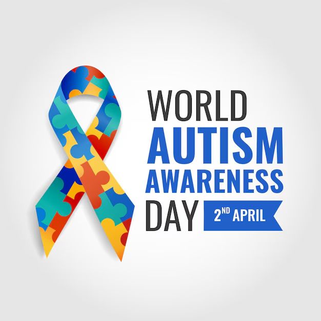 white background with a ribbon made up of coloured puzzle pieces. Next to it, text says 'world autism awareness day, 2nd April' 