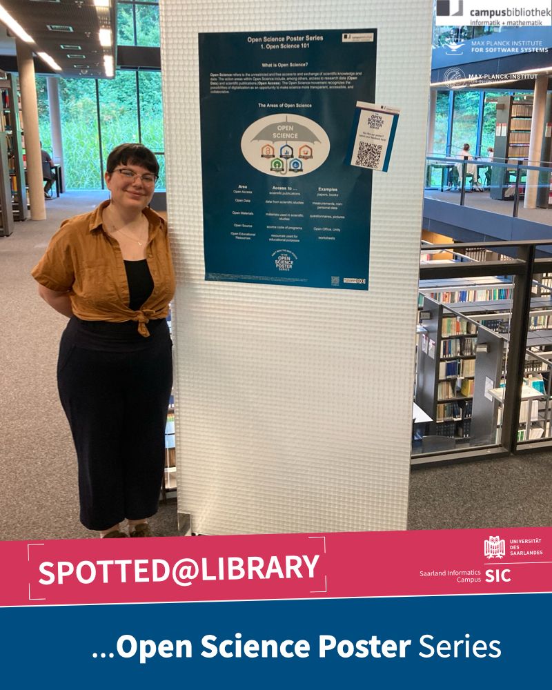 A woman standing next to a poster that is titled "Open Science Poster Series" in the Informatics & Mathematics campus library.