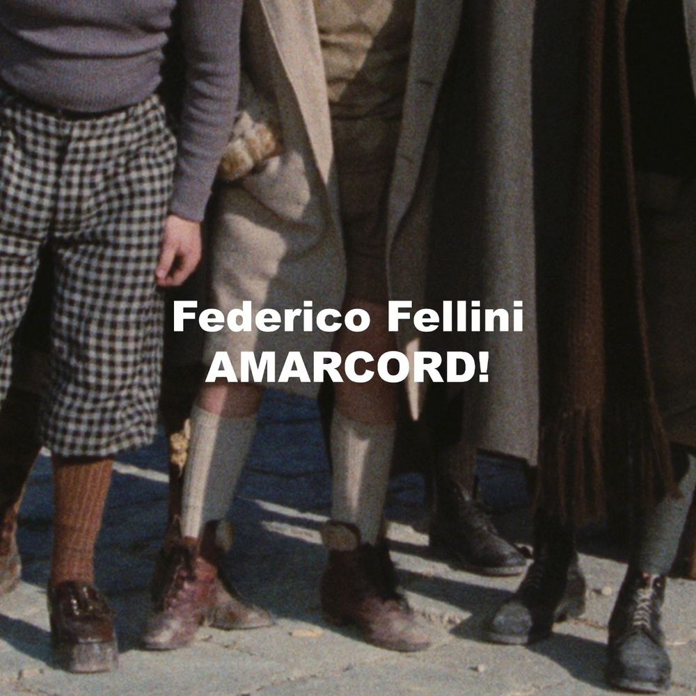 Text reading "Federico Fellini AMARCORD!" over a close up of feet of characters from the film.