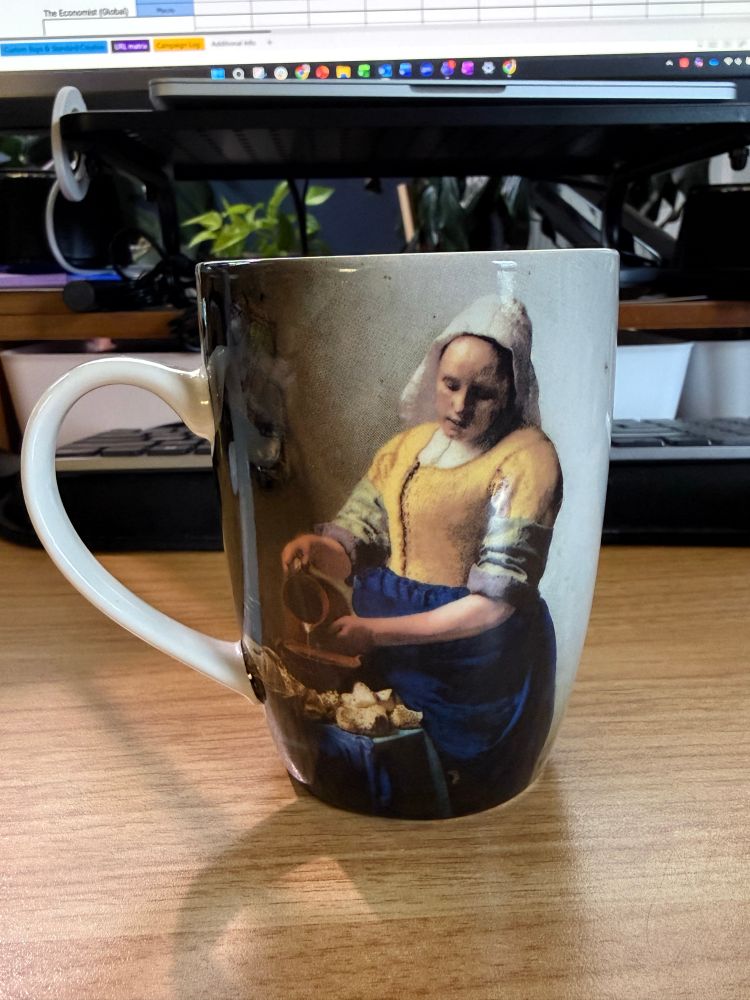 Coffee cup with Vermeer’s “The Milkmaid”