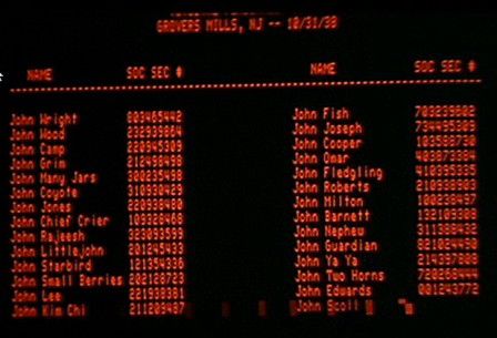 Still from the movie The Adventures of Buckaroo Banzai Across the 8th Dimesion showing a VT100 computer display with a list of Yoyodyne Propulsion employees, who all applied for Social Security cards on October 31, 1938. The first name of every employee is John, while the surname range from the mundane (Cooper, Wood) to the ridiculous (Small Berries, Ya Ya). 