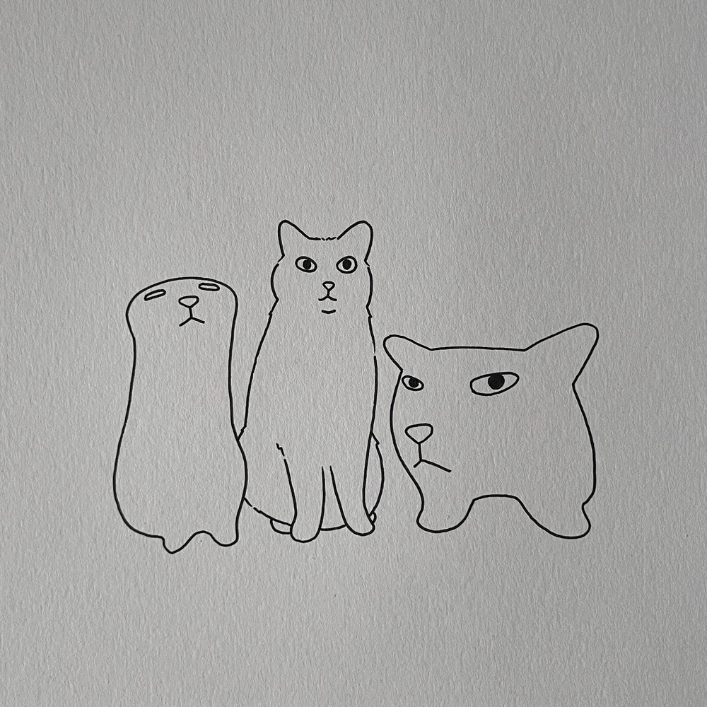 three poorly drawn cats. the one in the middle, also known as oye, has a normal upright cat shape, while the cats on either side have distorted forms with unusual facial expressions 
