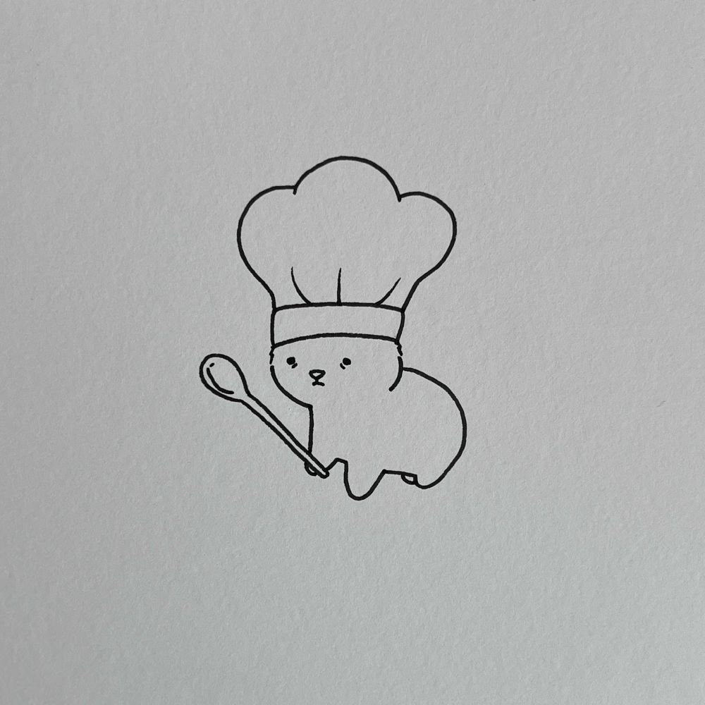 a poorly drawn cat dressed as a chef holding a wooden spoon, the drawing is made with black pen on a high textured paper