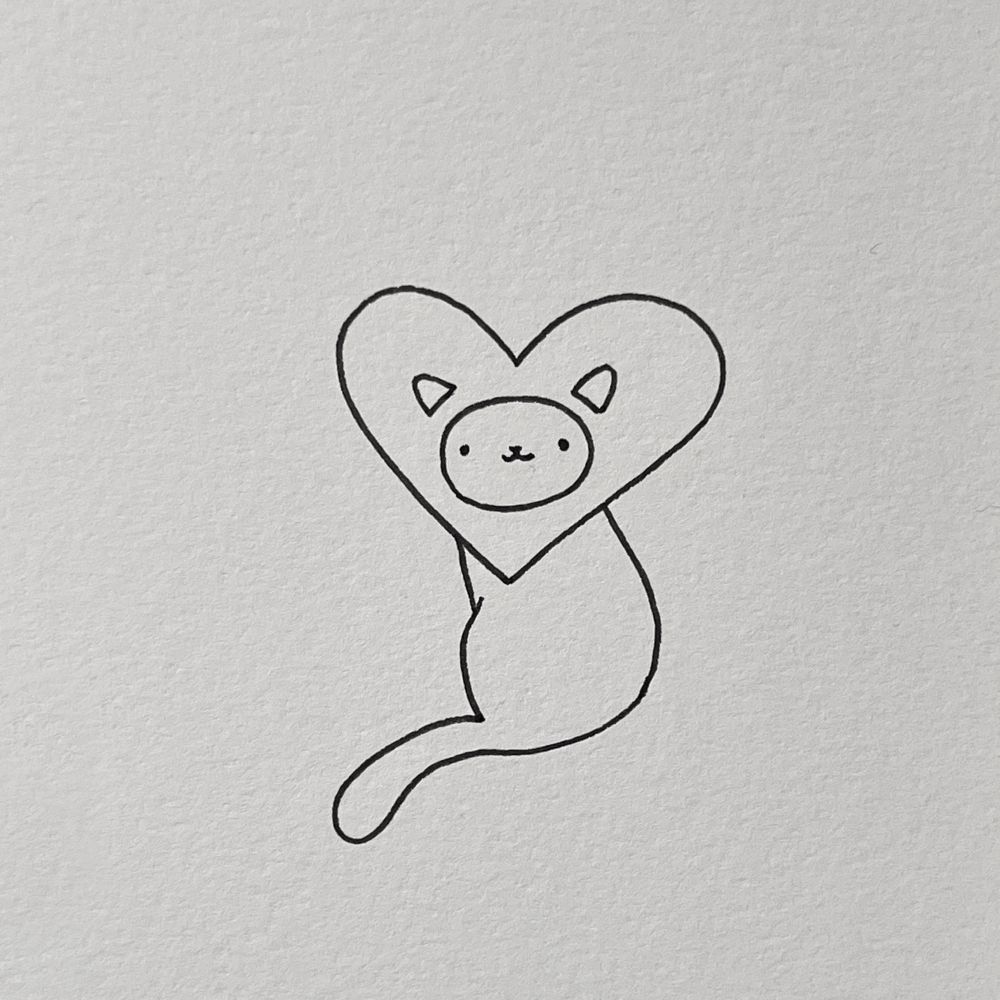 a poorly drawn cat with a heart around its head, it’s looking directly at you making you feel loved (because you are!)