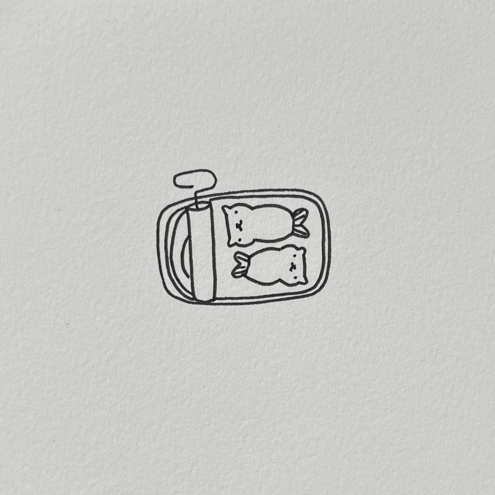 a simple doodle of an opened tin can with two fish (with cat faces) inside